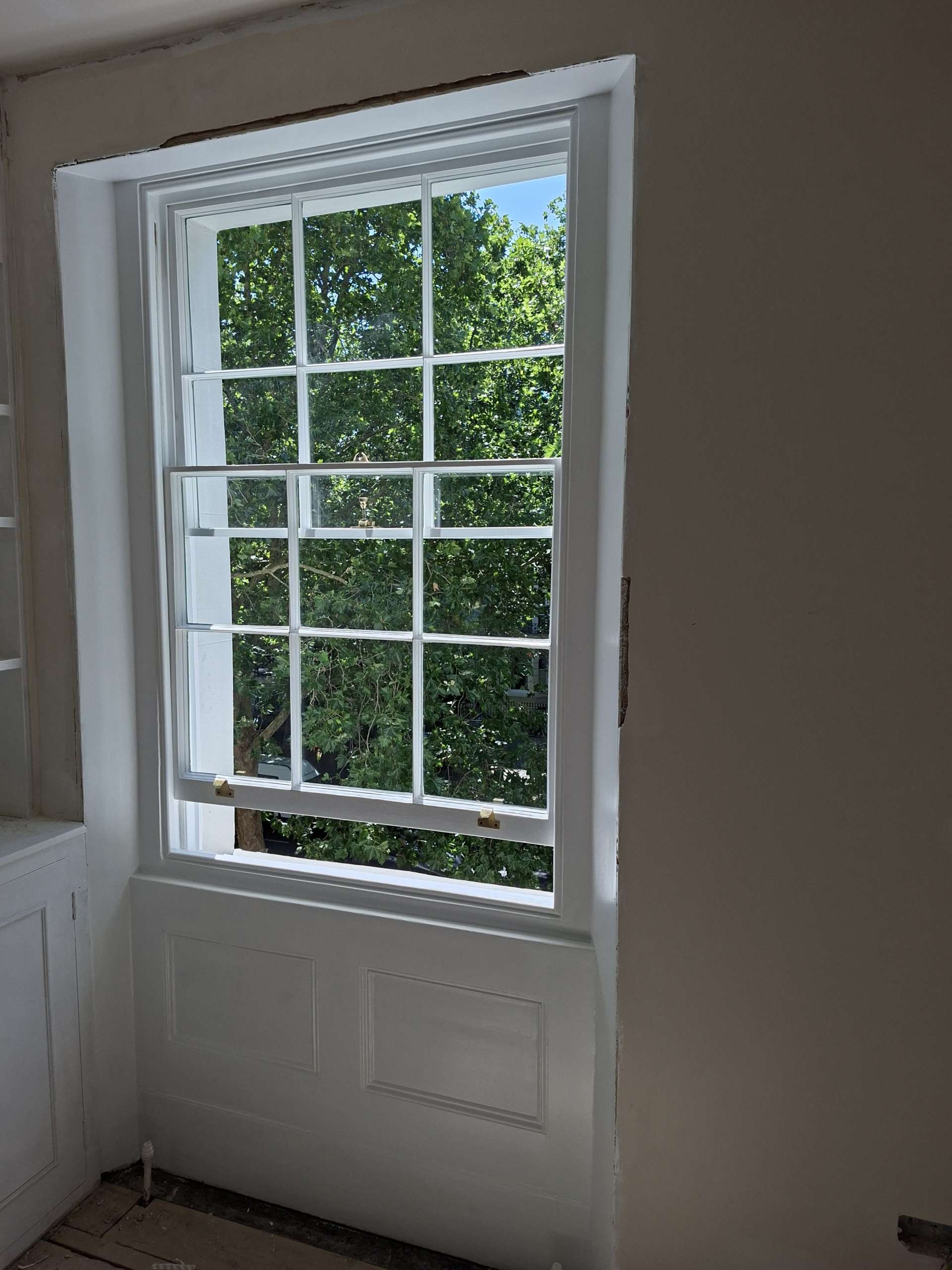 Completed sash window refurbishment and glass upgrade in Holland Park